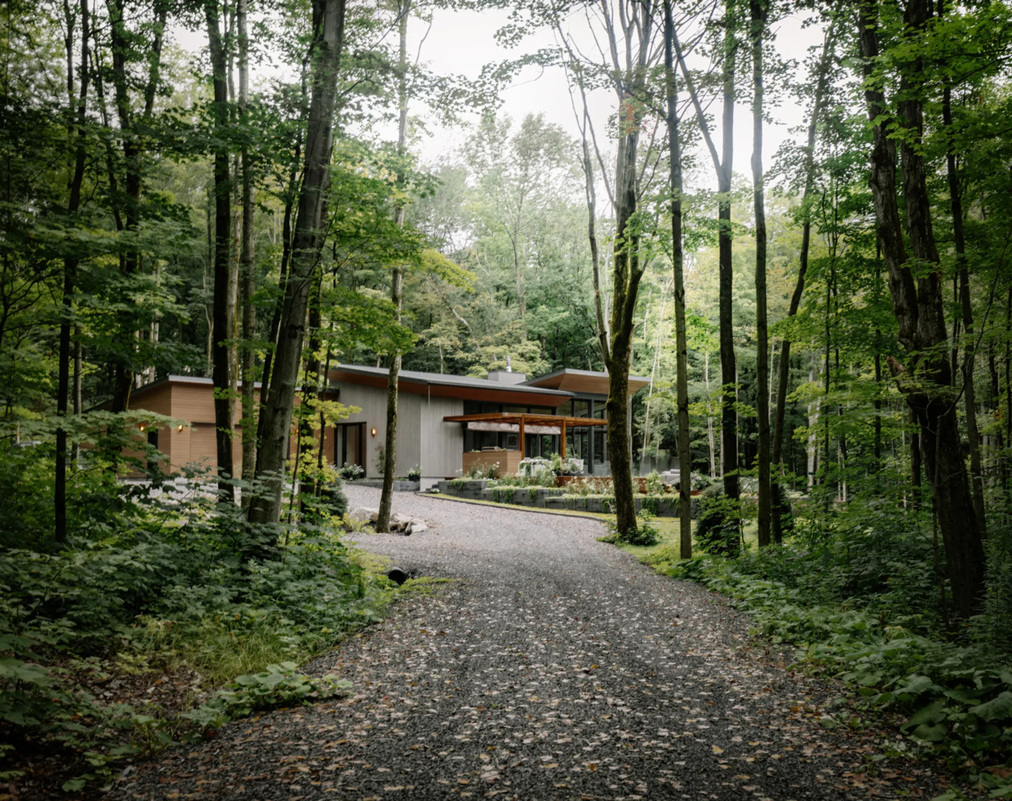 Oakhill House by Matière Première Architecture | Forest-Integrated Luxury Residence in Bromont, Canada
