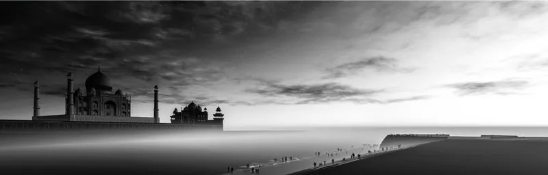 Silhouette of a domed monument complex rising above low mist with visitors on the sand below
