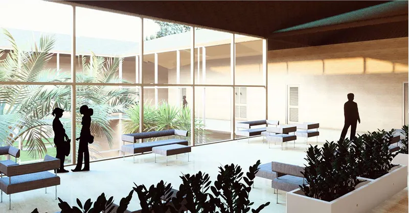 Interior lounge with planted beds and full-height windows overlooking a palm-lined courtyard