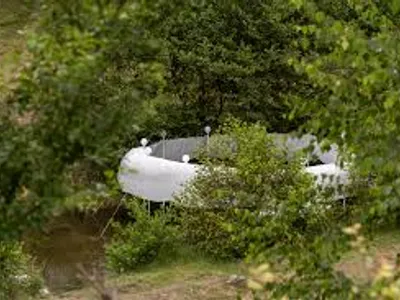 Temporary Installation at a Mountain River by atelier VRAC — A Harmonious Dialogue Between Nature, Light, and Geometry
