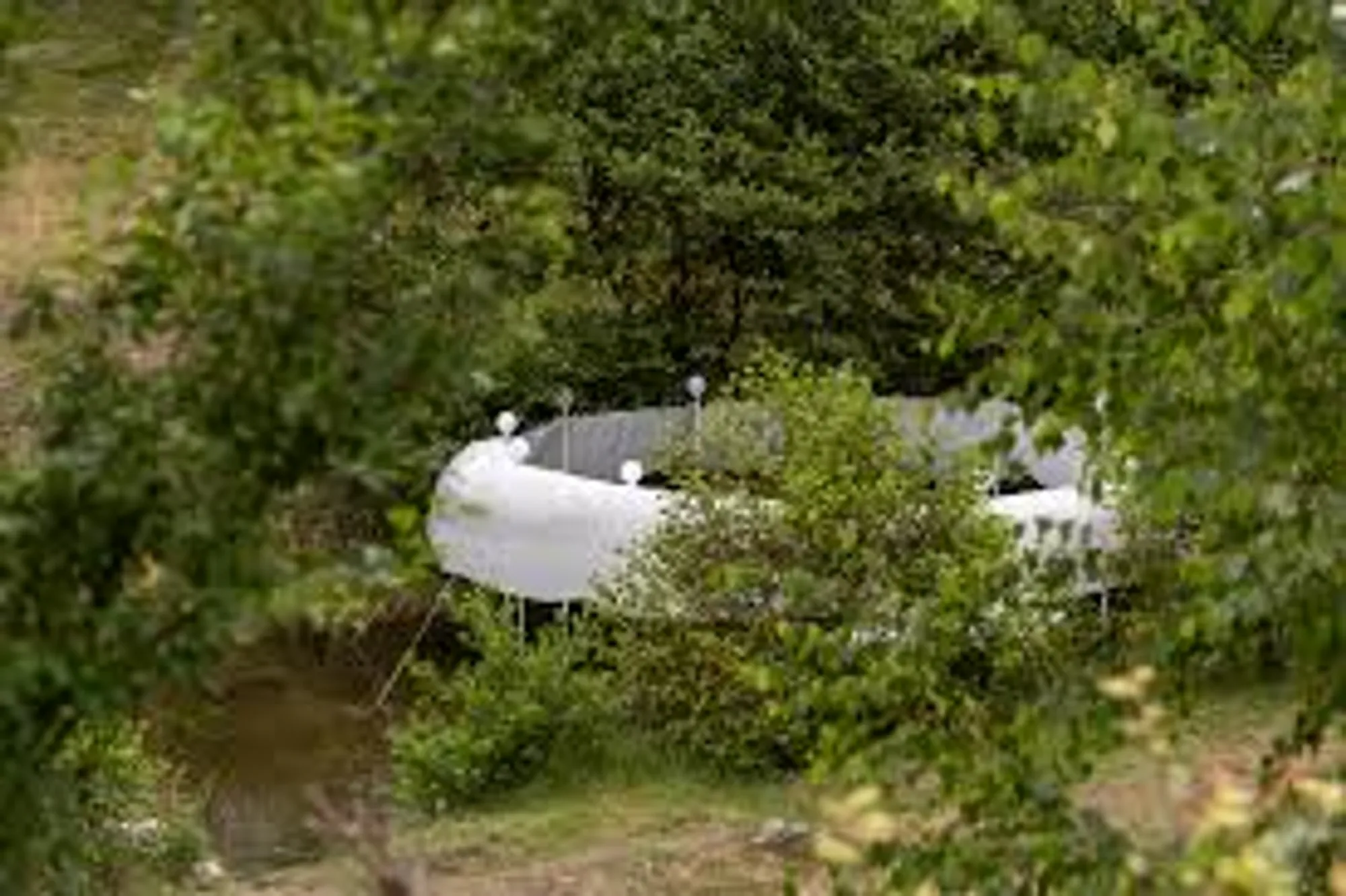 Temporary Installation at a Mountain River by atelier VRAC — A Harmonious Dialogue Between Nature, Light, and Geometry