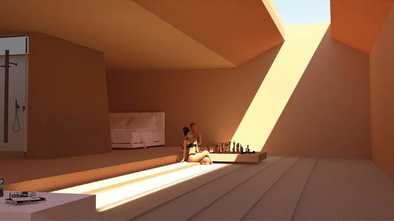 Stepped interior space with a diagonal skylight cutting warm sunlight across terracotta plaster surfaces