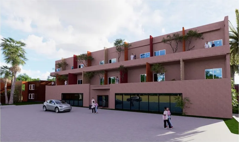 Street view of the stepped pink stucco facade with terraces and palm trees under partly cloudy skies