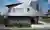 Two Large Roofs Leaning Together by KOMINORU Design