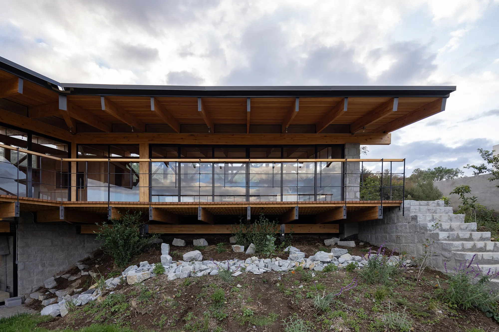 House of the Rolling Rooms by Rama Estudio: A Transformative Rammed Earth Home in the Hills of Quito