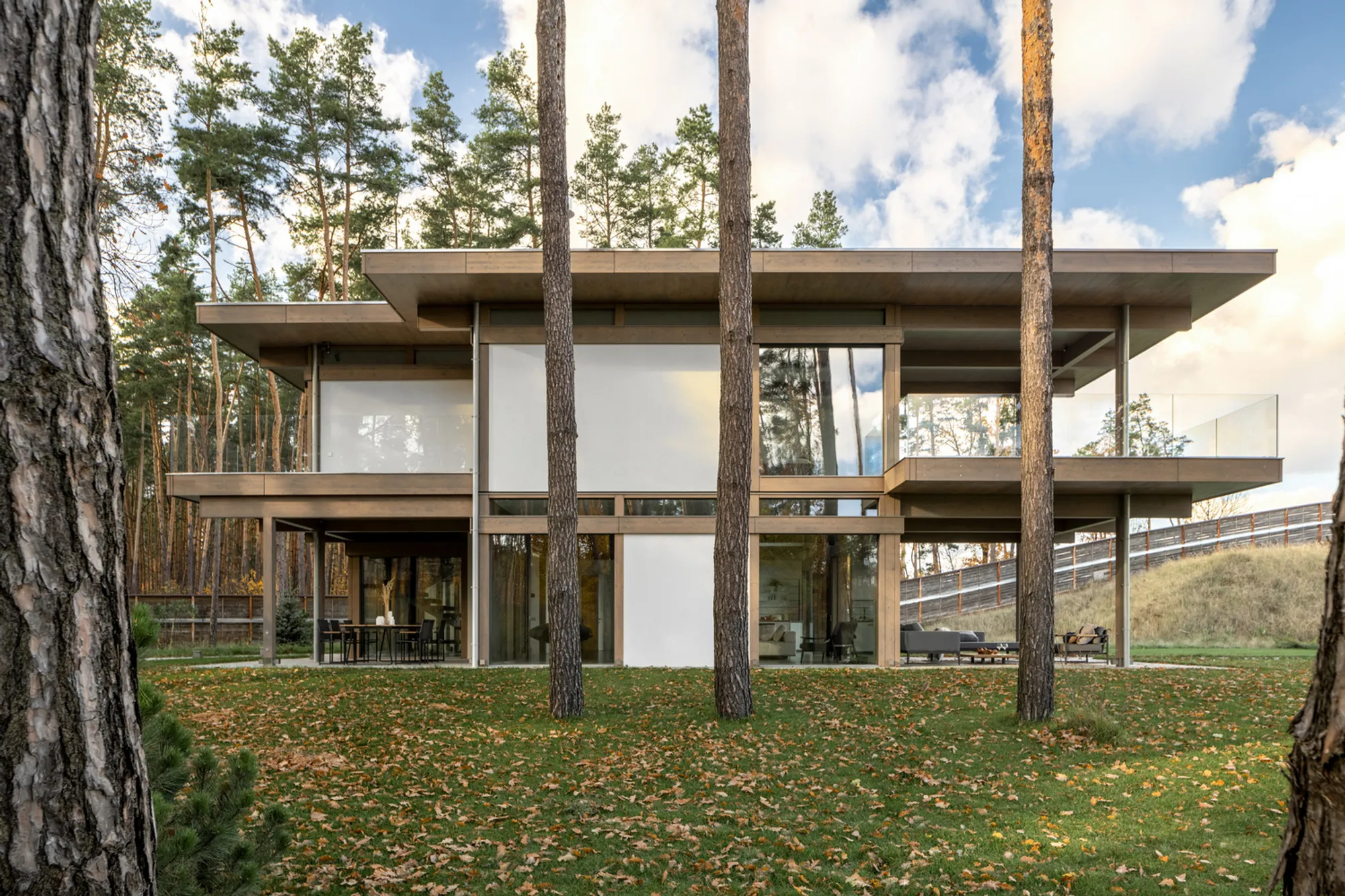 Forest House by Karlikova Architects: A Minimalist Retreat Immersed in Nature