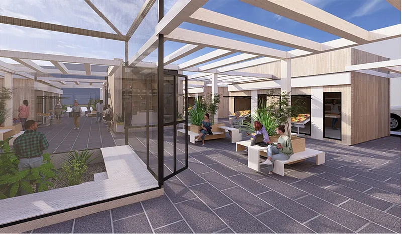 Courtyard with steel-framed glass canopy, planted beds, white seating blocks, and people relaxing under blue sky