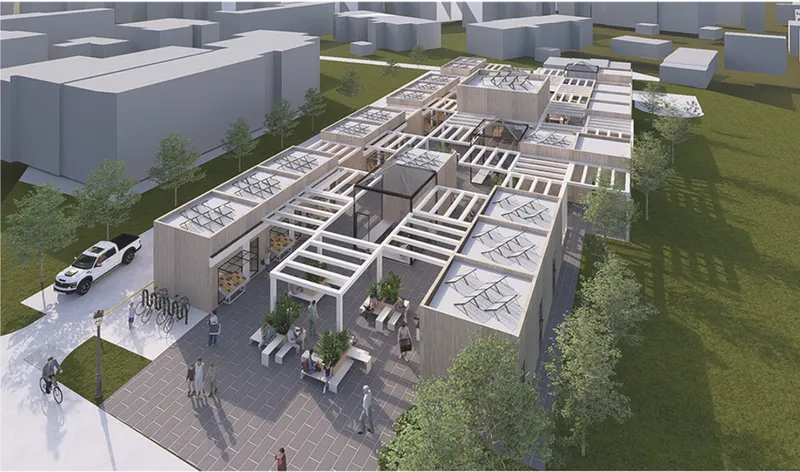 Aerial view of the modular complex with alternating open and enclosed bays and people gathering below