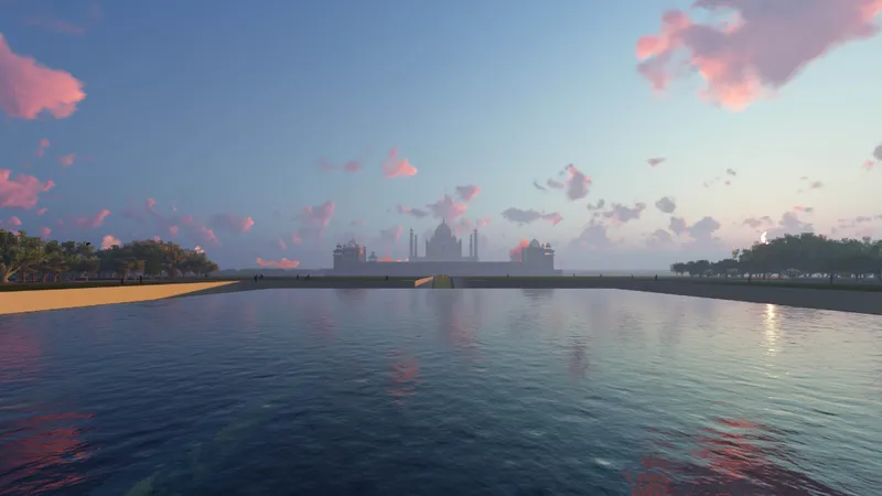 Reflecting pool stretching toward a symmetrical structure at dusk with pink clouds overhead