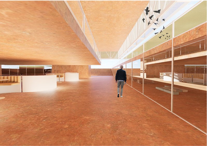 Interior ramp with rammed earth flooring leading toward a clerestory skylight with birds flying overhead