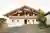 House with an Elevated Roof by Maximilian Hartinger Architekt