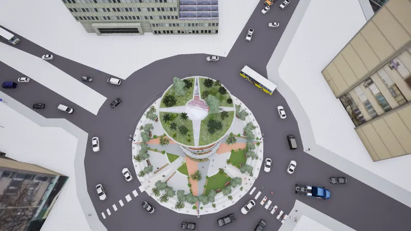 Aerial view of the circular landscaped plaza with radial pathways surrounded by vehicular traffic