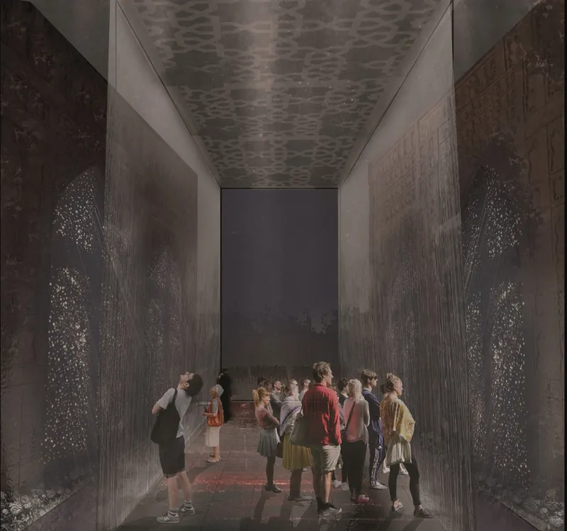 Narrow gallery corridor with perforated wall panels and patterned ceiling as visitors gather below