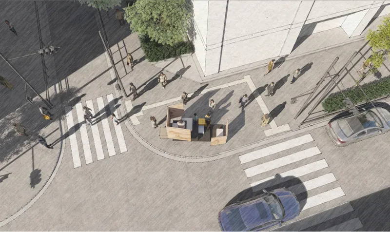 Aerial view of a timber kiosk installation at a pedestrian crossing with people and vehicles passing by