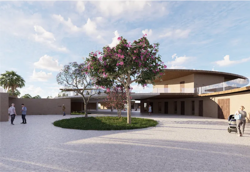 Rendered exterior view of the circular colonnaded building with flowering trees and visitors in the courtyard