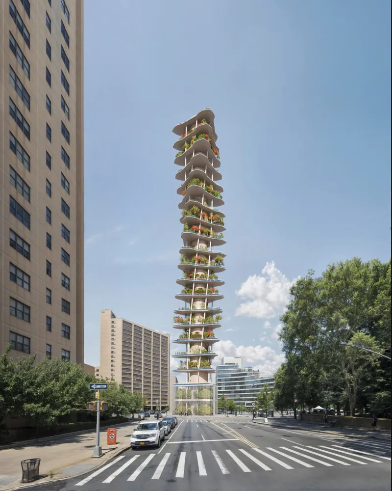 Slender tower with offset planted terraces rising above a tree-lined street on a summer afternoon