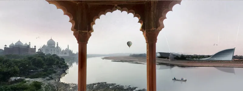 View through carved wooden arches overlooking a river with a hot air balloon floating above at dawn
