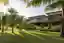 This architectural image showcases a modern, two-story house with a tropical design. The house featu