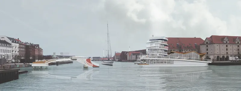 Long view across the harbor showing the spiral tower and curved waterfront structures with sailing boats