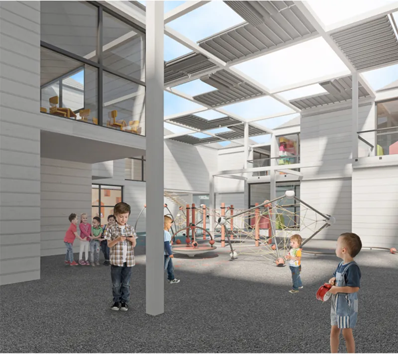 Interior courtyard beneath a slatted canopy grid with children playing near climbing structures on rubber surfacing