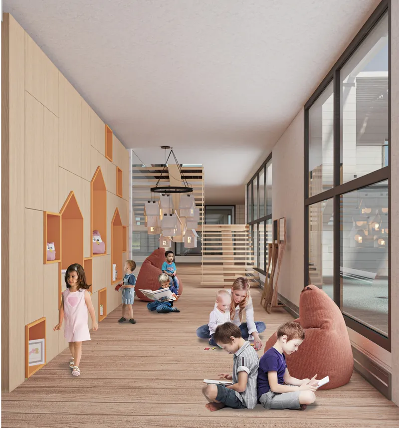 Interior corridor with plywood wall panels, timber flooring, and children seated under pendant lighting near glazed partitions