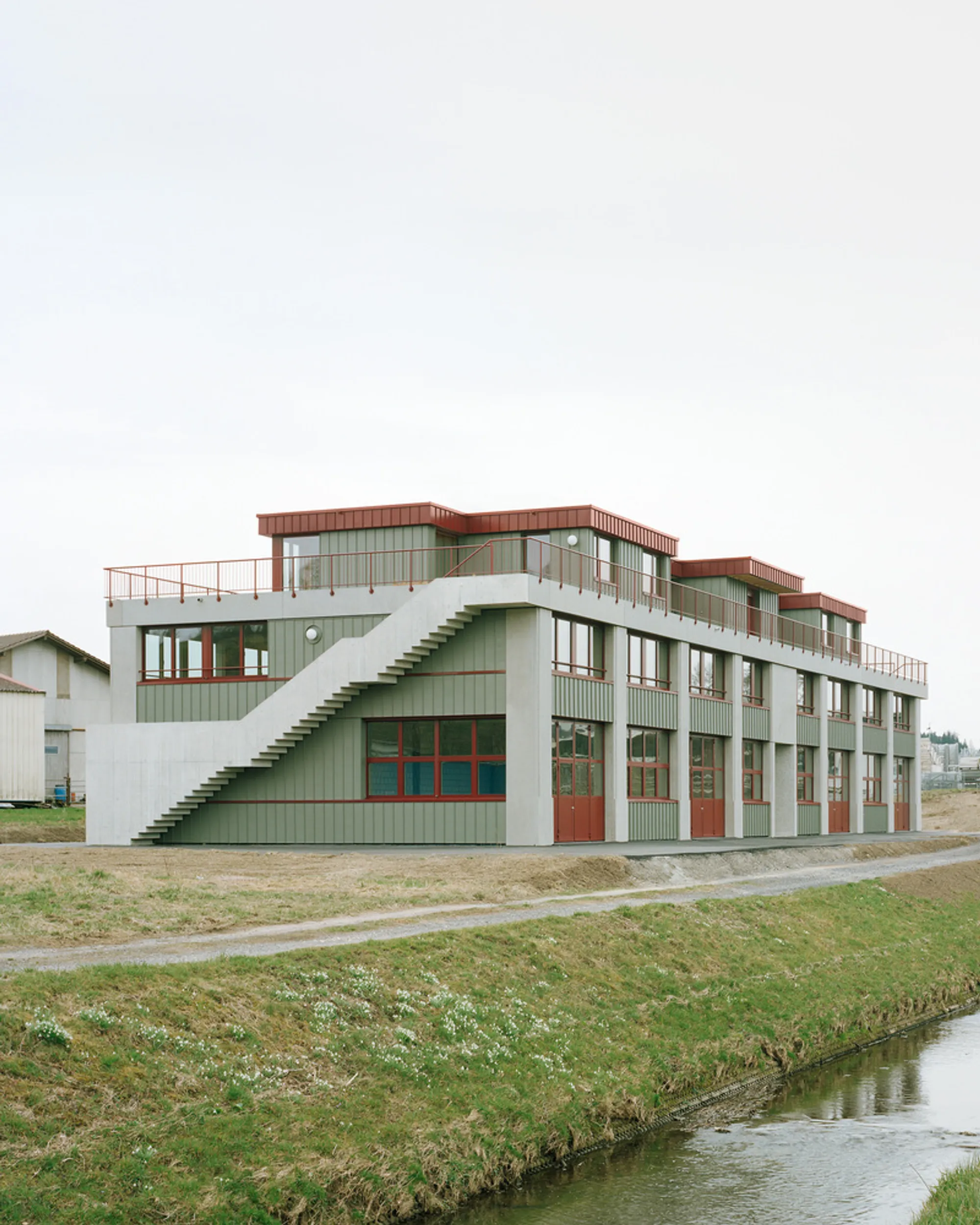 Mixed-Use Building in Forel (Lavaux): A Contemporary Blend of Industry and Living by Samir Alaoui Architectes