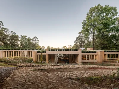 KM House: A Contemporary Sanctuary Crafted from Earth, Concrete, and Light