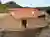 Jeronimo House: A Harmonious Fusion of Pink Concrete and Vineyard Landscape by Stefano Riva Architetto
