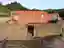 Jeronimo House: A Harmonious Fusion of Pink Concrete and Vineyard Landscape by Stefano Riva Architetto