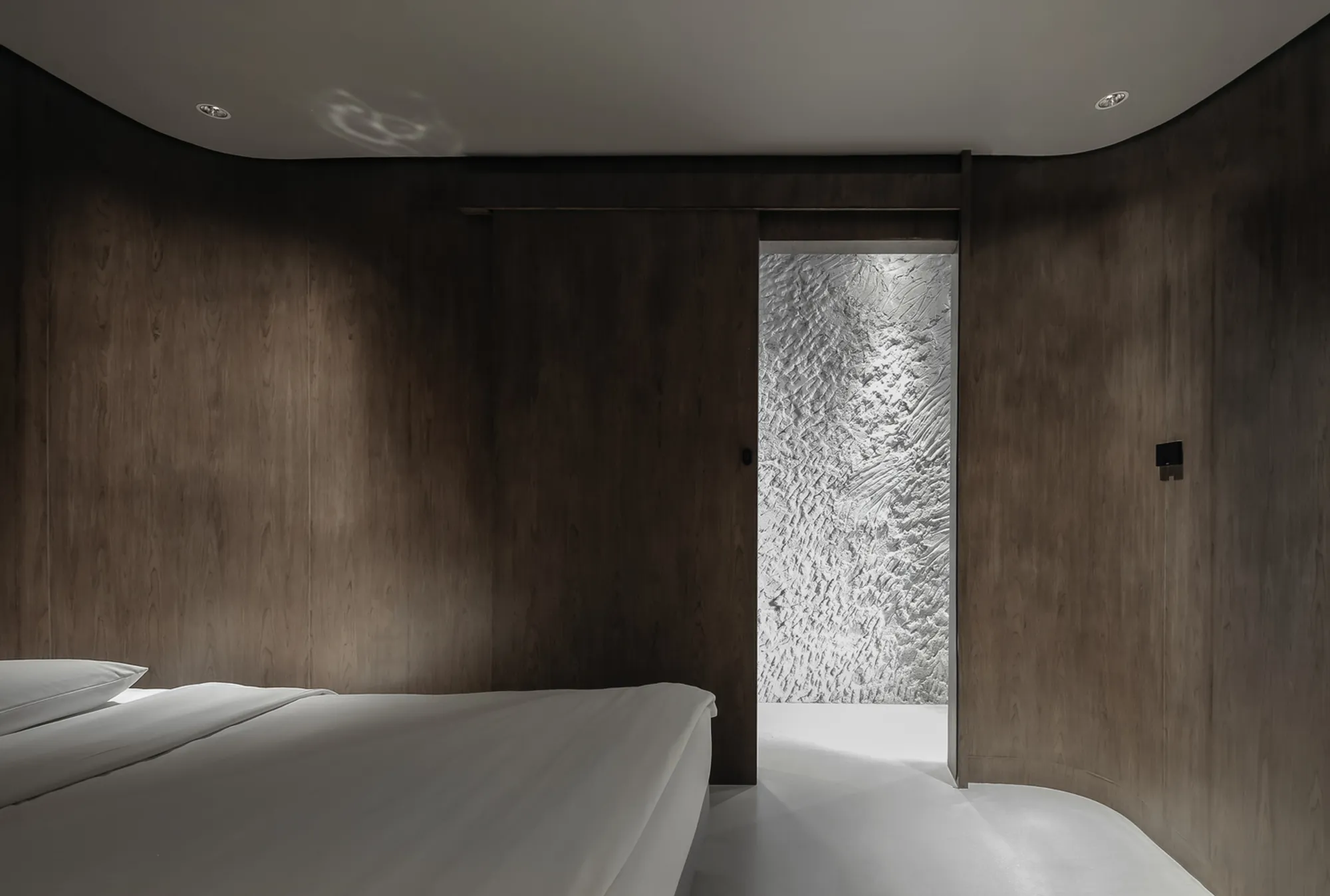 Sandwash Apartment: Rediscovering Raw Materials in Modern Bangkok Interiors