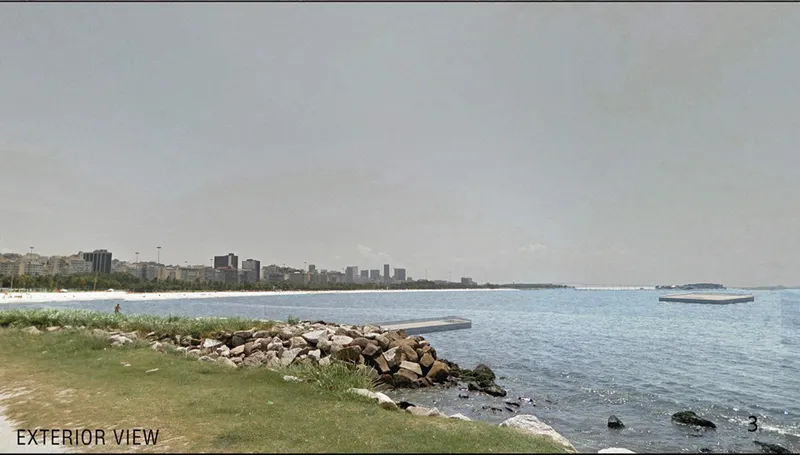 Rocky shoreline with grassy embankment and floating platform in the bay