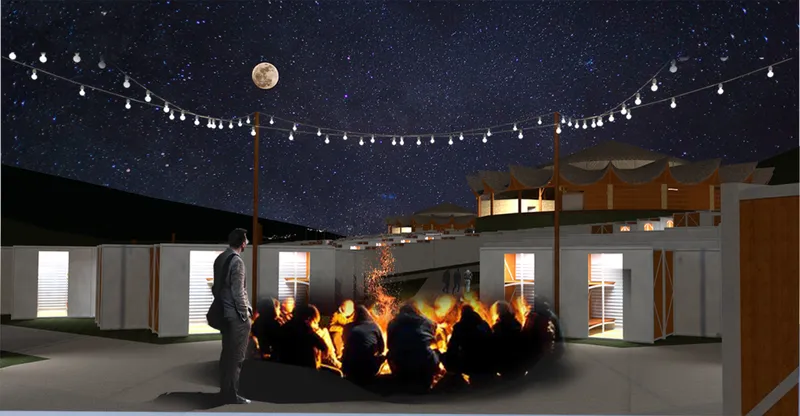 Night rendering of the modular units arranged around a central fire pit under string lights and stars