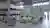This image showcases the interior of a large industrial warehouse, characterized by its high ceiling