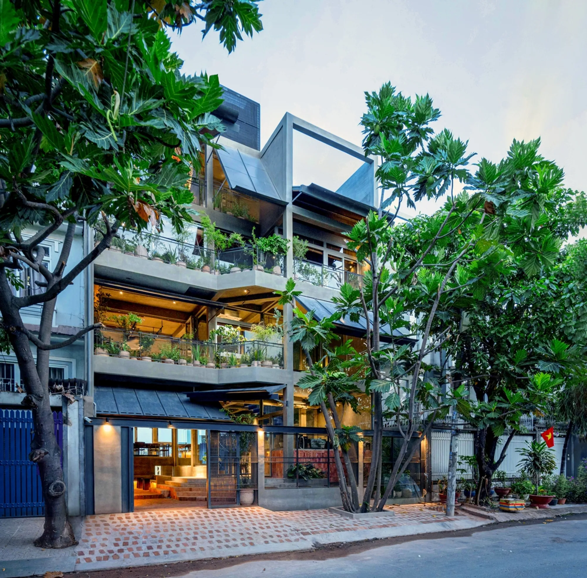 Dom-Ino Hub: Transforming a Riverfront Villa into a Vibrant Community Space