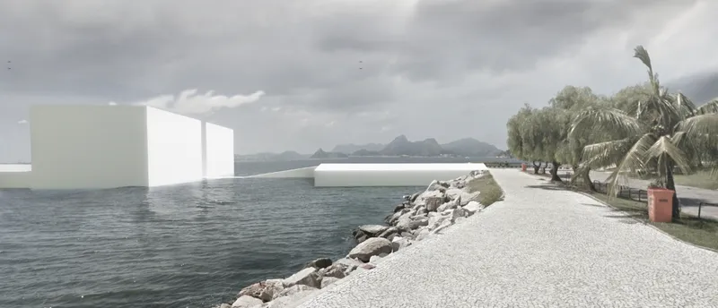 Coastal promenade with palm trees and a rocky edge facing white volumes floating offshore