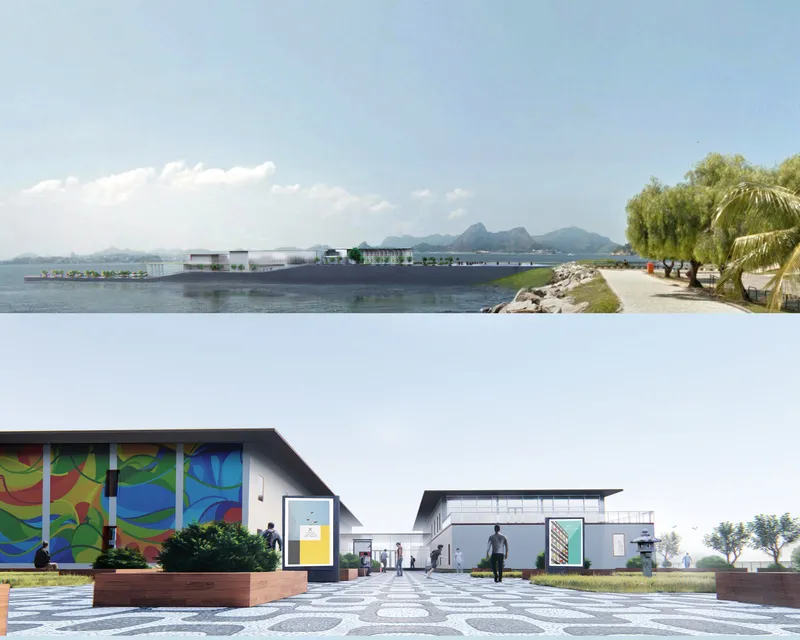Waterfront complex with patterned paving and palm trees viewed from a distant shoreline promenade