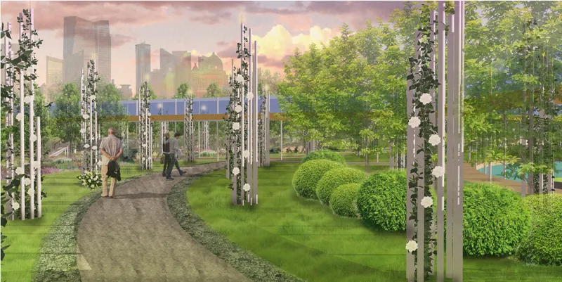 Park view with birch grove, mounded shrubs, and elevated horizontal structure against a sunset sky