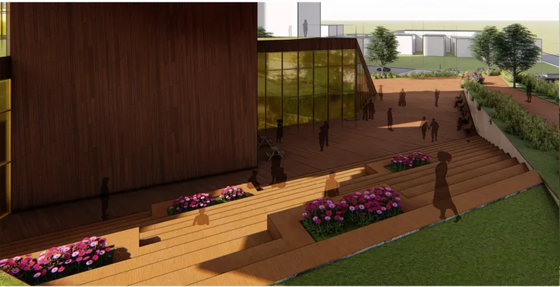 Elevated timber deck plaza with planted beds of purple flowers and figures at dusk