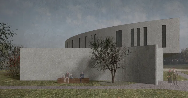 Corner view of the textured concrete wall with vertical openings and figures gathered beneath a bare tree
