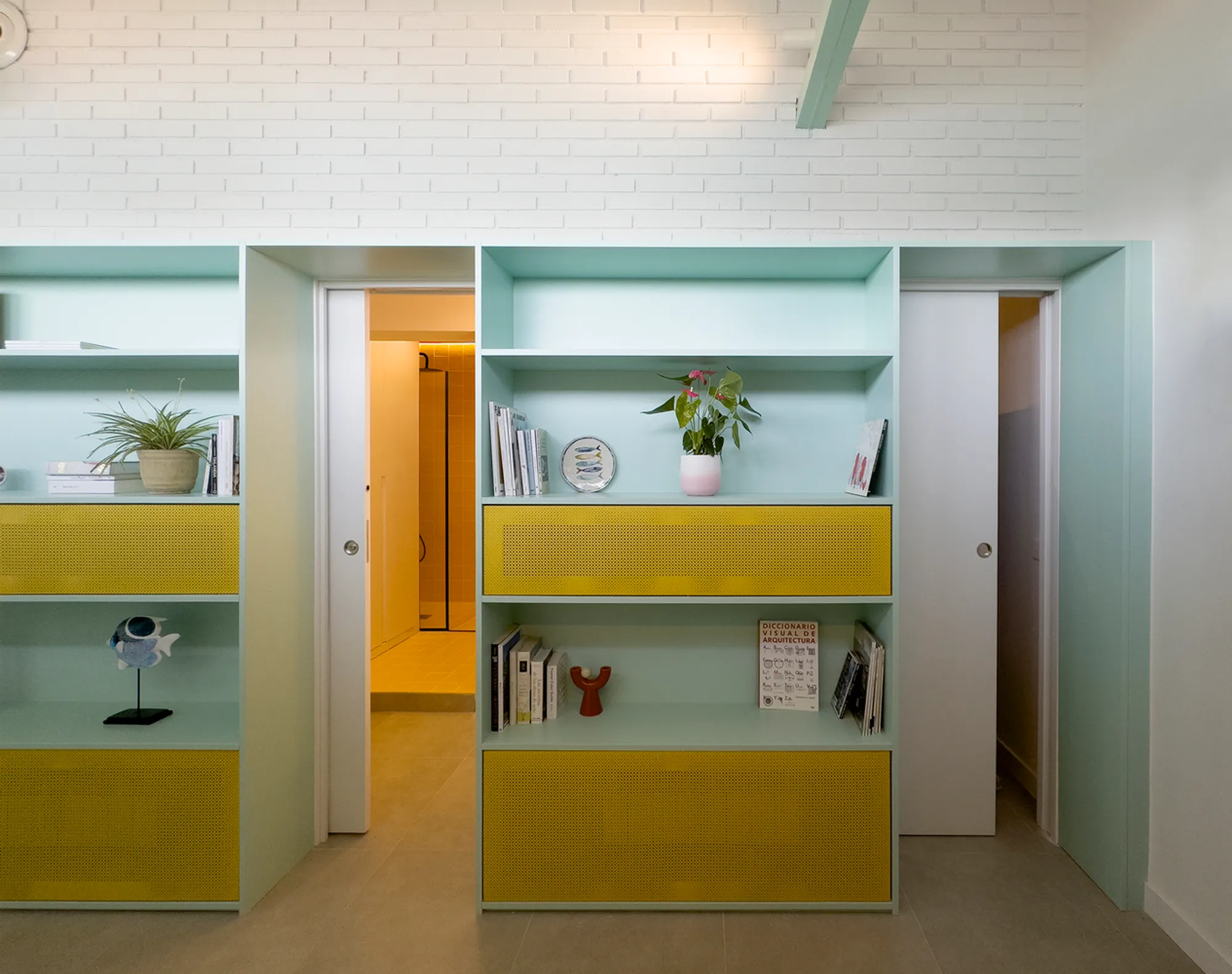 House JN109 by SUAV: A Bold and Colorful Attic Apartment Renovation in Madrid
