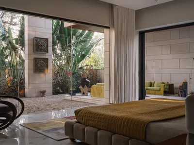 Anand Home: Luxury Courtyard House Design by Hiren Patel Architects