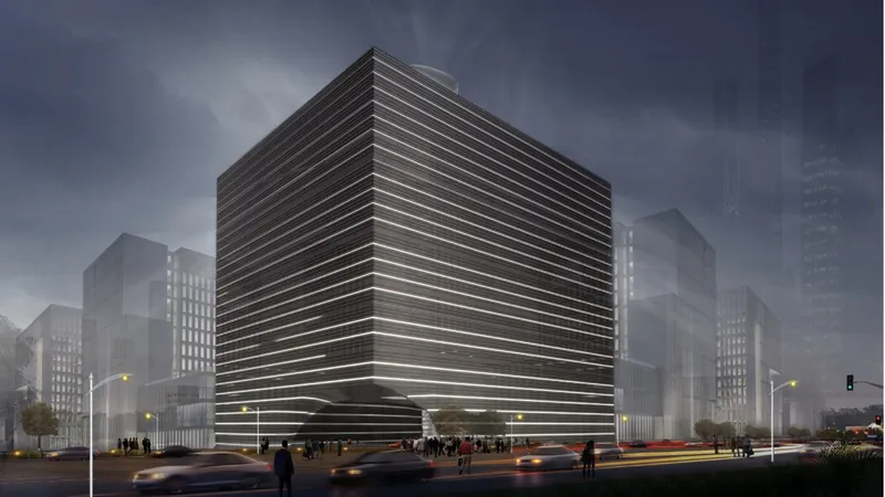 Street view of the horizontal banded facade lit at dusk against a misty urban skyline
