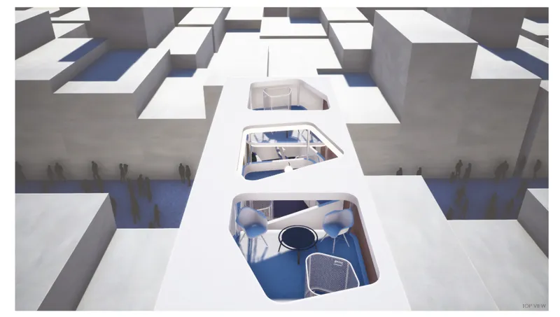 Aerial view of a physical model showing three roof openings revealing interior spaces within an urban block
