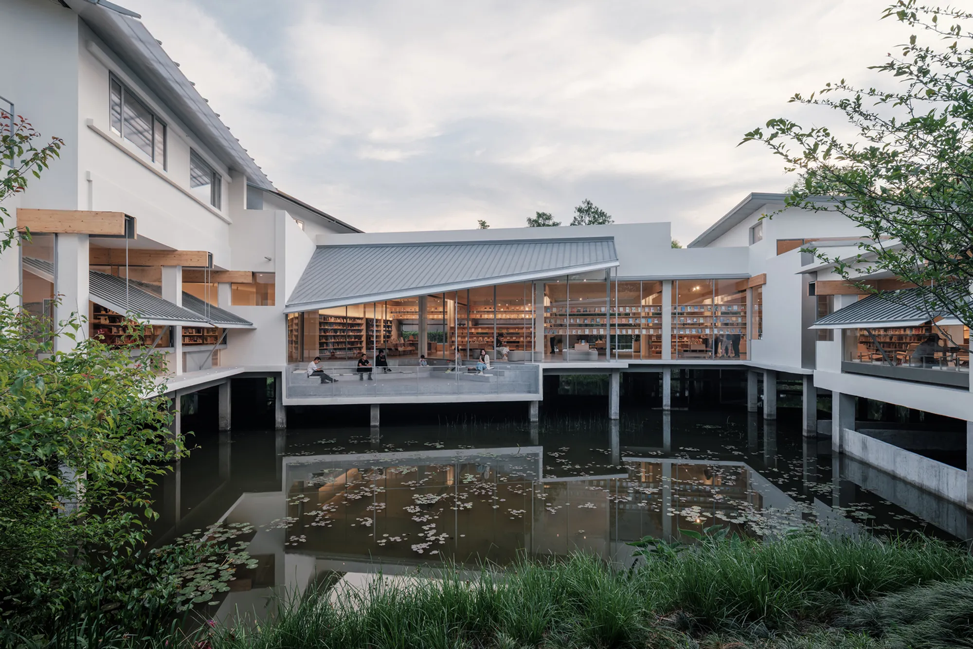 Bookstore Architecture in Wetlands: Xixi Goldmye Bookstore by Atelier Wen'Arch