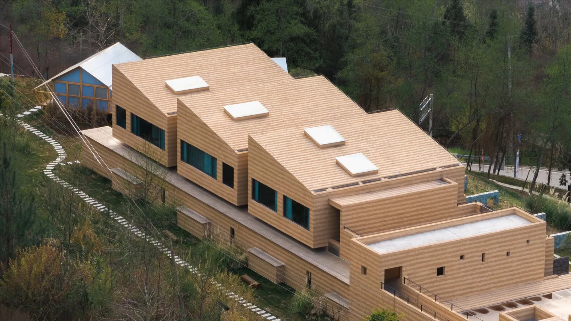 Plum Villa by Archermit: A Contemporary Homage to Qiang Heritage