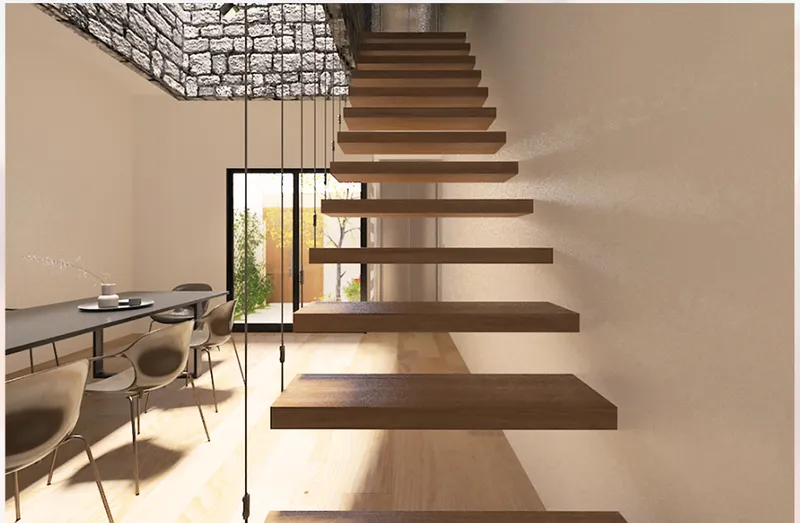 Cantilevered timber staircase with glass railing overlooking dining area in morning light