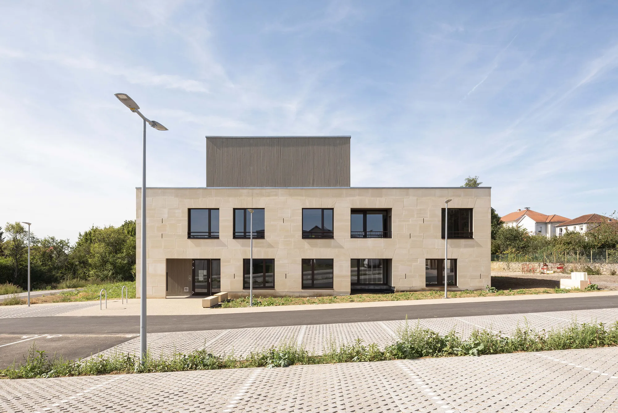 Health Municipal Clinic in Audun-Le-Roman by Studiolada: A Sustainable Stone and Timber Architecture