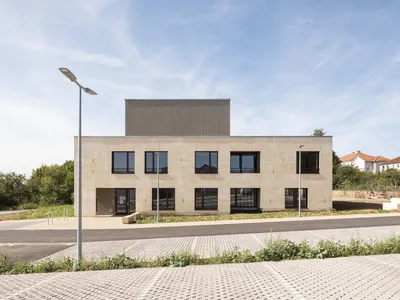 Health Municipal Clinic in Audun-Le-Roman by Studiolada: A Sustainable Stone and Timber Architecture