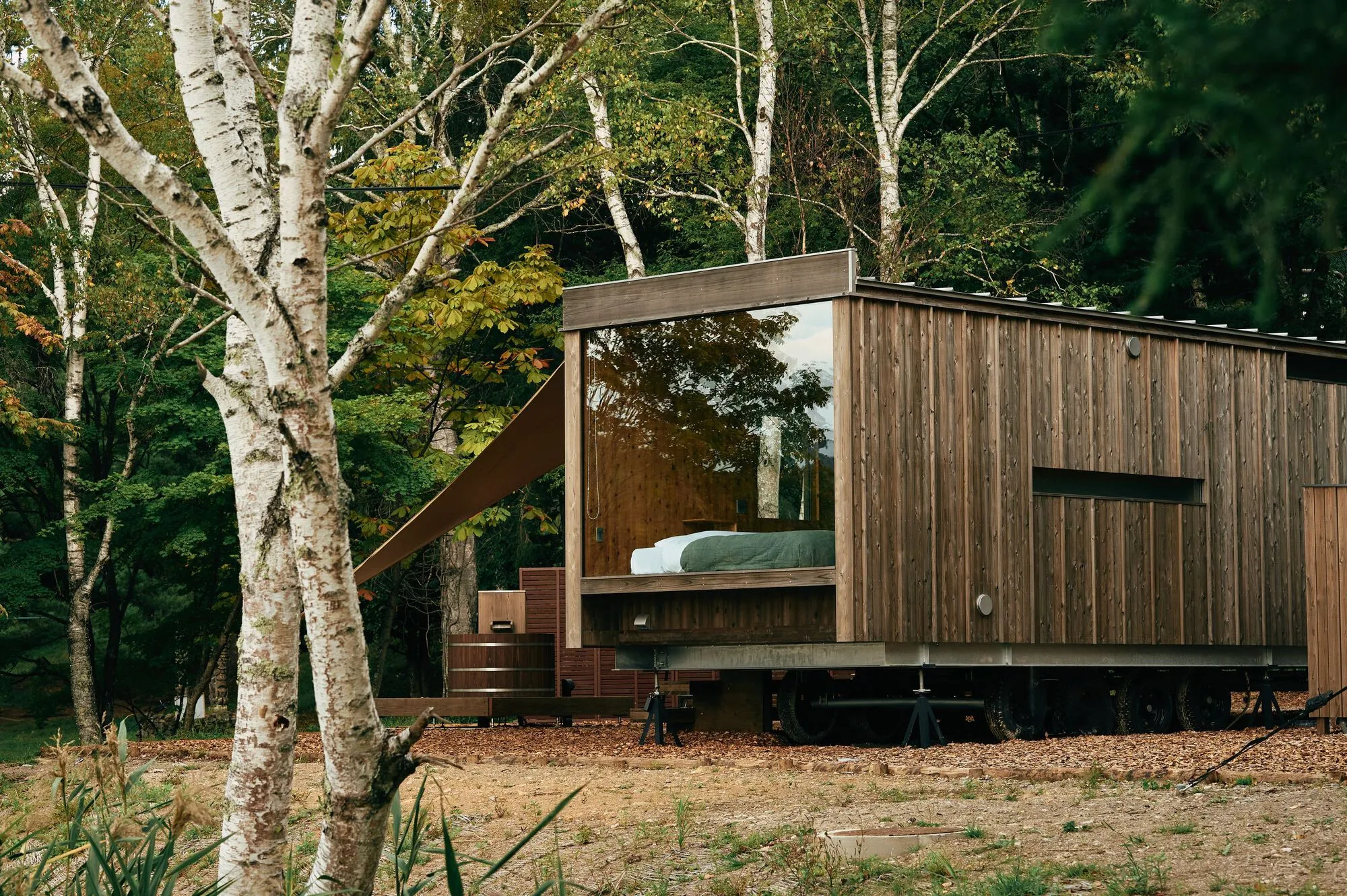 Earthboat Cave: Mobile Cabin by PAN- PROJECTS: A Nature Escape in Shirakabako, Japan