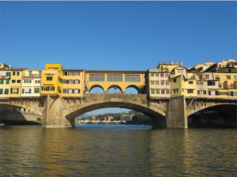 Historic Ponte Vecchio reference, inspiring inhabited bridge architecture with integrated urban fabric.